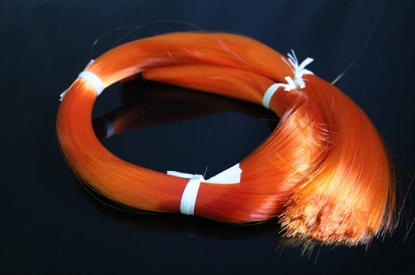 Coruss synthetic vegan bow hair orange